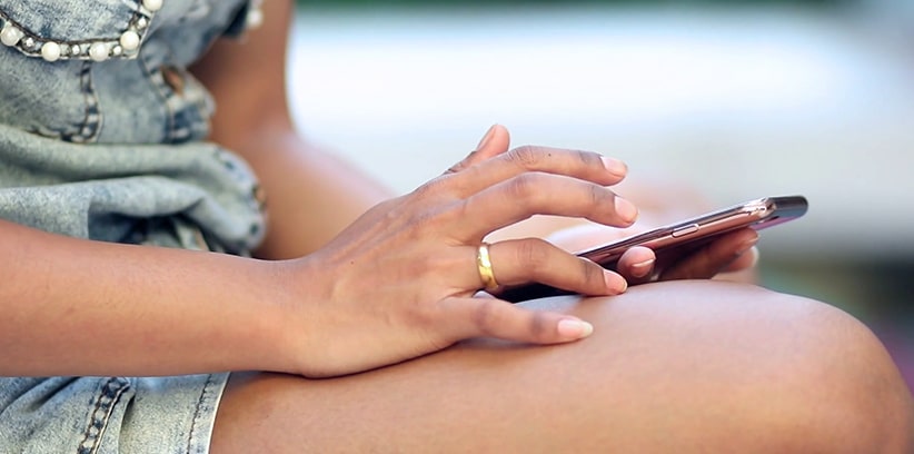 woman using her phone