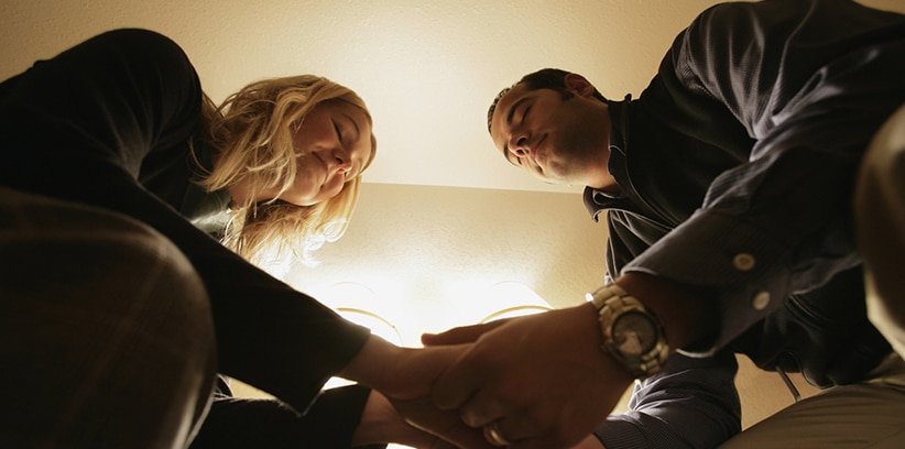 couple praying together