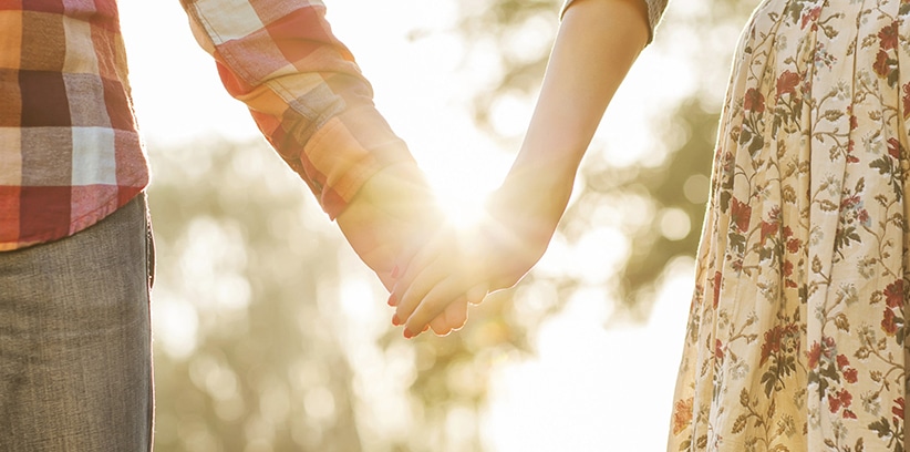 couple holding hands