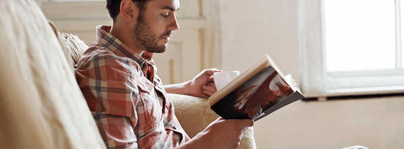 man reading books