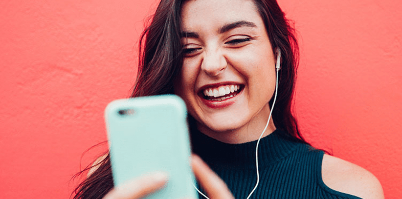happy woman using smartphone