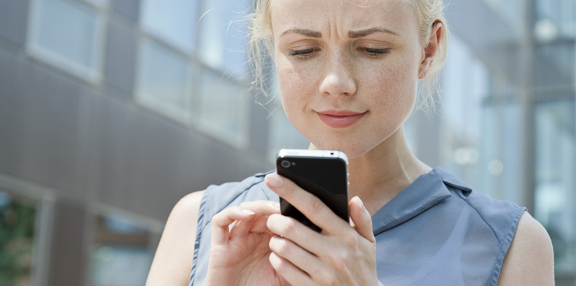 woman checking someone else' dating profile