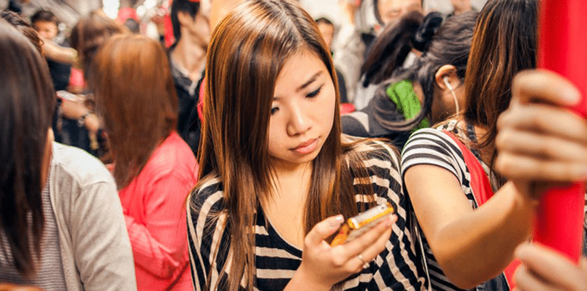 busy woman using her smartphone