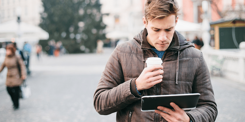 men searching via his tablet