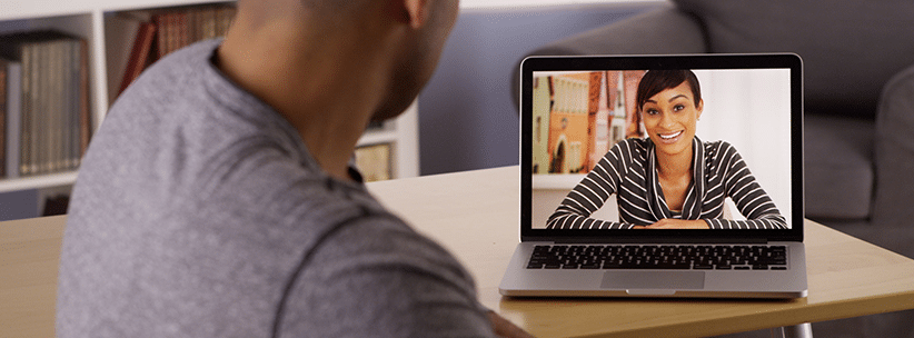 happy woman chatting her long distance partner