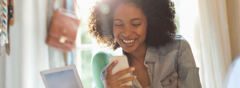 happy woman chatting via dating app