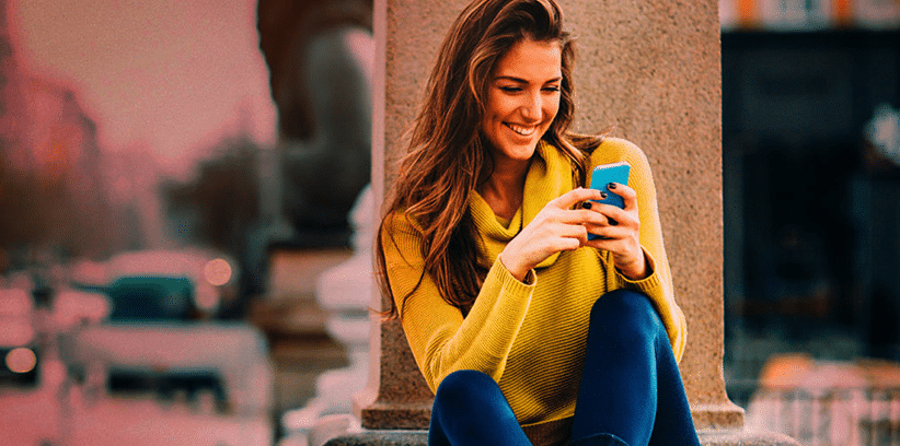 happy woman chatting with someone else