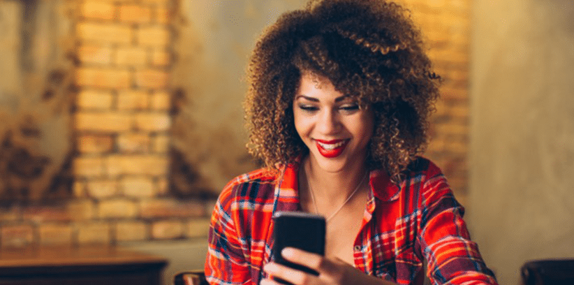 happy woman chatting with someone else