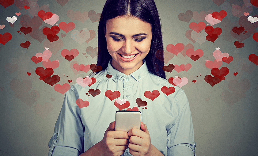 happy woman using a dating app