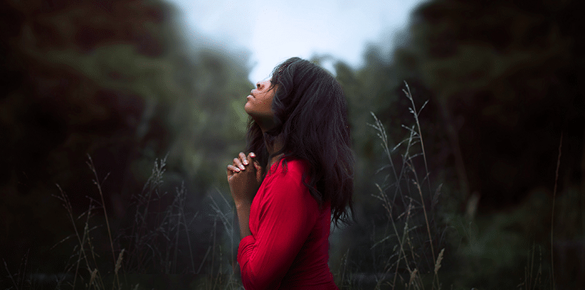 woman praying to God