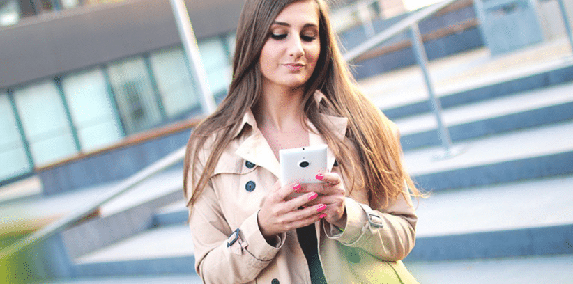 curious woman talking to somebody else over the phone