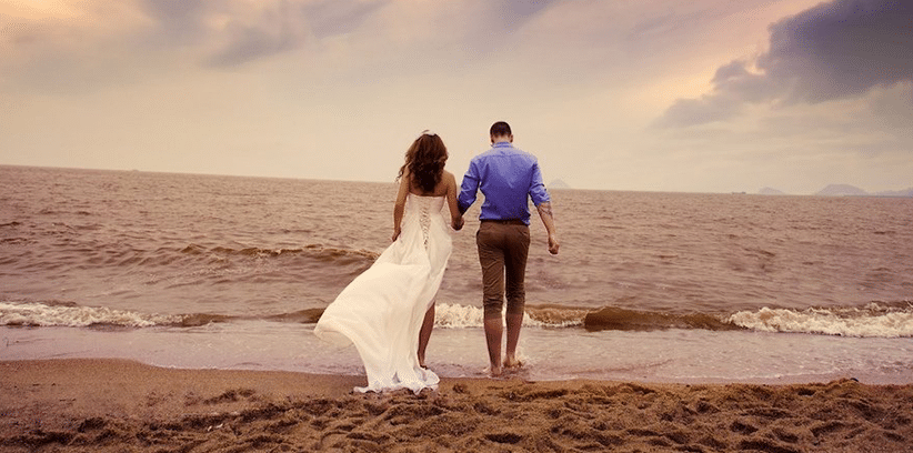 happy couple at the beach