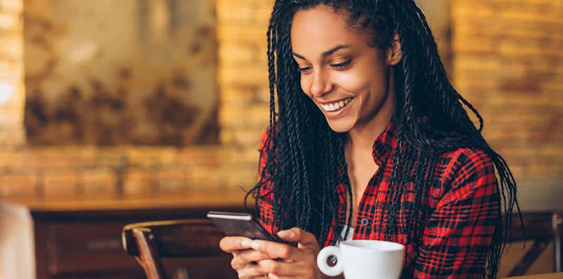 happy woman chatting with someone else