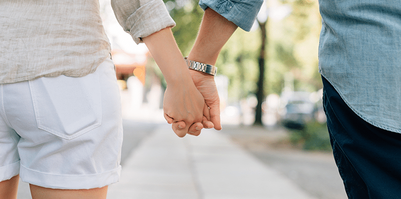 couple holding hands