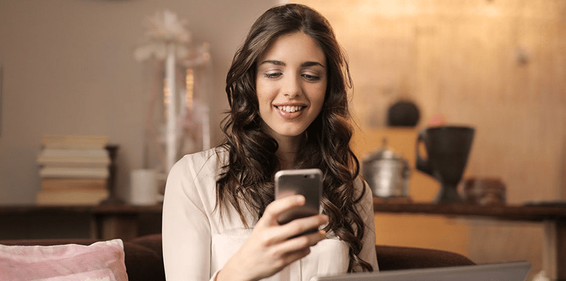 happy woman talking to somebody over the phone