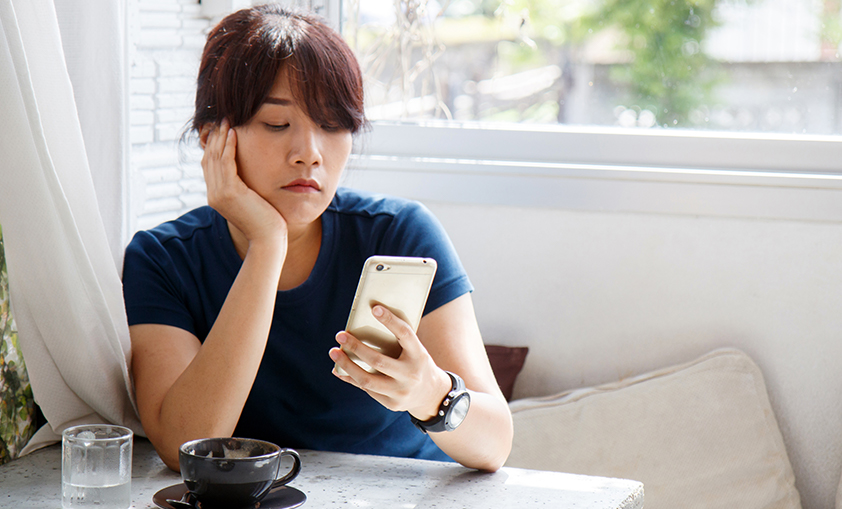 unhappy person talking to someone over the phone